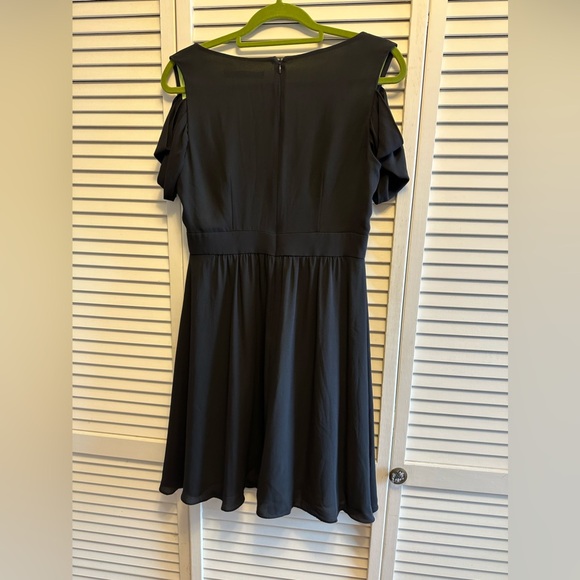 Marc New York Andrew Marc Black Off Shoulder Dress with Bright Green Lining. - Picture 3 of 6